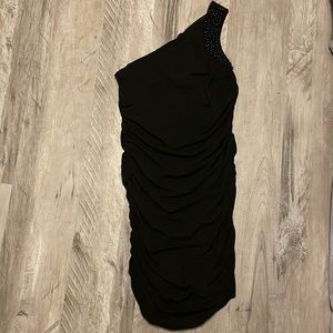 This is a 2000’s black dress from YA Los Angela’s